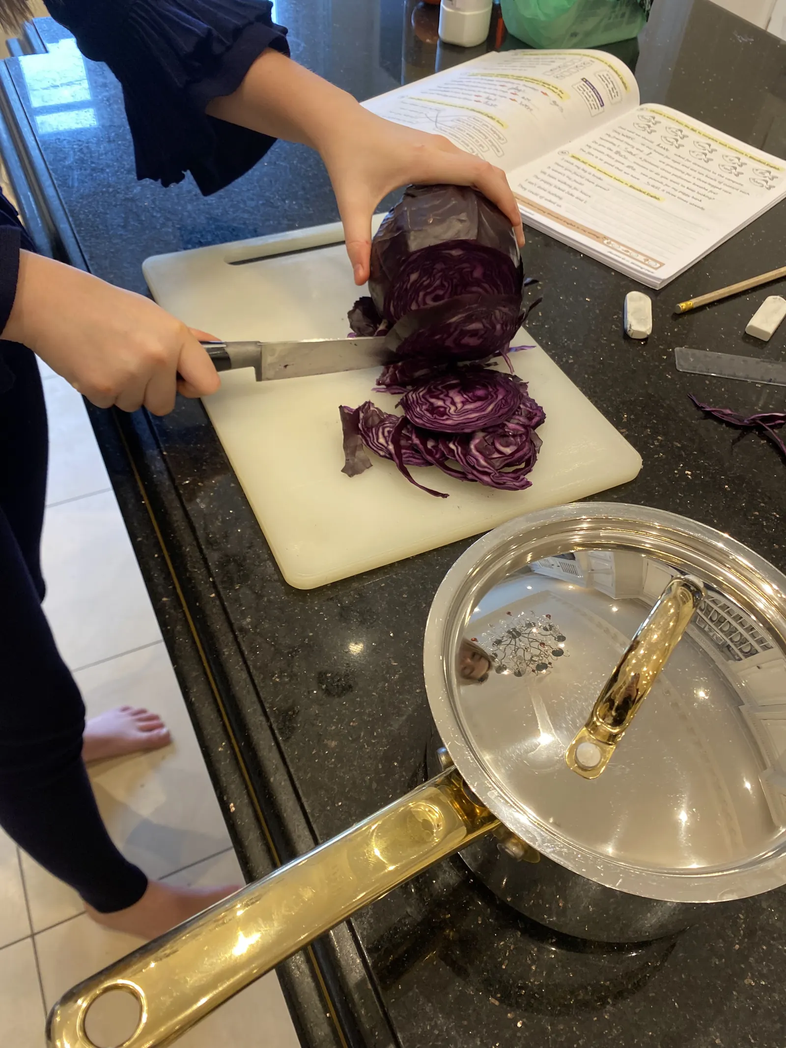 Red cabbage being chopped on a kitchen board for a science lesson